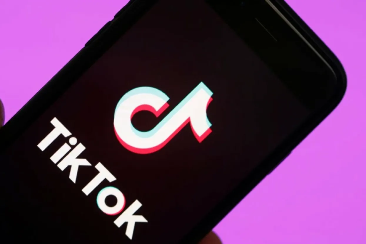 PARIS, FRANCE - MARCH 05: In this photo illustration, the social media application logo, Tik Tok is displayed on the screen of an iPhone on March 05, 2019 in Paris, France. The social network broke the rules for the protection of children's online privacy (COPPA) and was fined $ 5.7 million. The fact TikTok criticized is quite serious in the United States, the platform, which currently has more than 500 million users worldwide, collected data that should not have asked minors. TikTok, also known as Douyin in China, is a media app for creating and sharing short videos. Owned by ByteDance, Tik Tok is a leading video platform in Asia, United States, and other parts of the world. In 2018, the application gained popularity and became the most downloaded app in the U.S. in October 2018. (Photo by Chesnot/Getty Images)